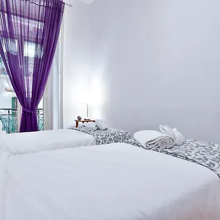 Апартаменты Guesthost - Residenza Mura Greche Historic Center